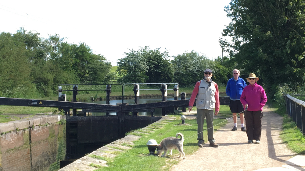 Di, Davide, Kevin and Billy next to some lock gates on the Grnd Union Canal.