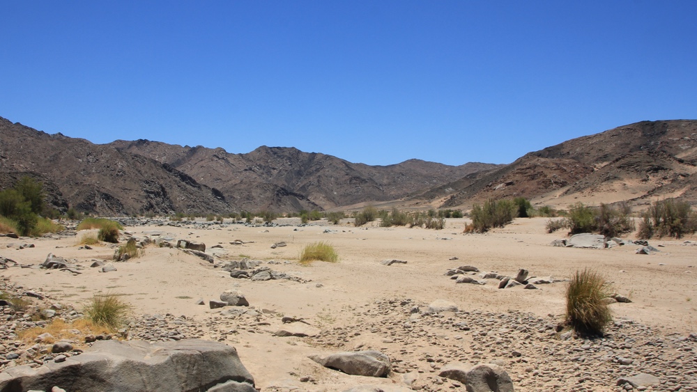 the dry Fish River where it enters the Orange River. 