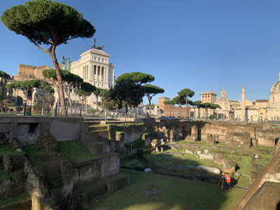 the Roman Forum with the King Victor Emmanuel monument in the background.