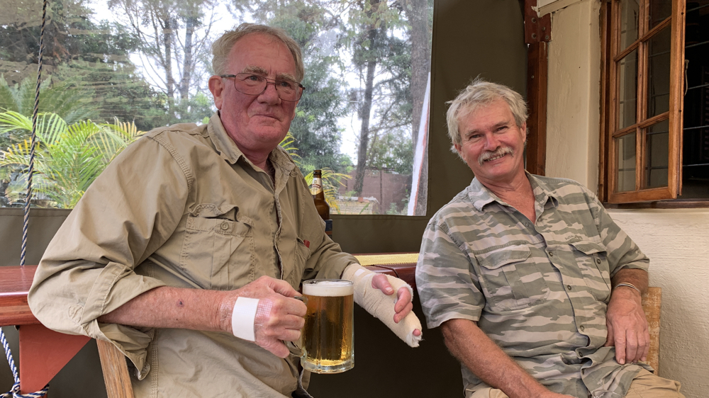 Kevin and Geoff enjoying a beer after Kevin's hand operation.