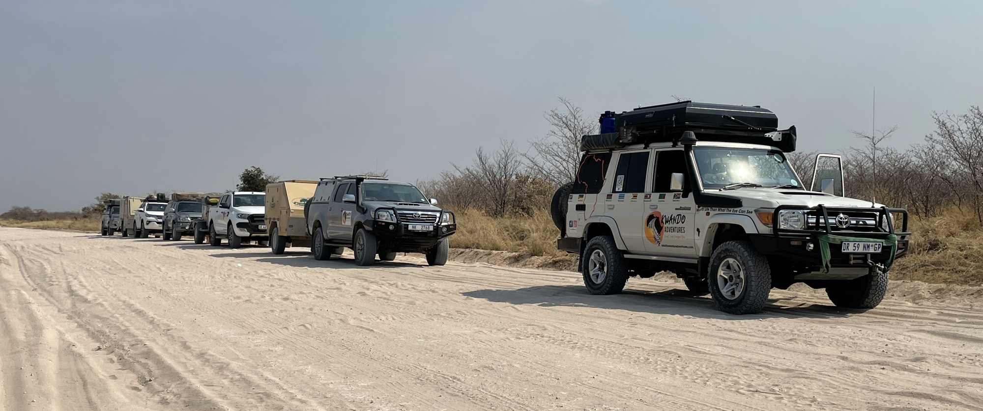 Our 6 vehicles setting off towards Xade.