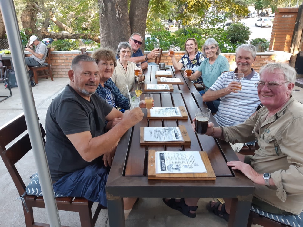Our group of 8 having a drink at a pub in Vic Falls.